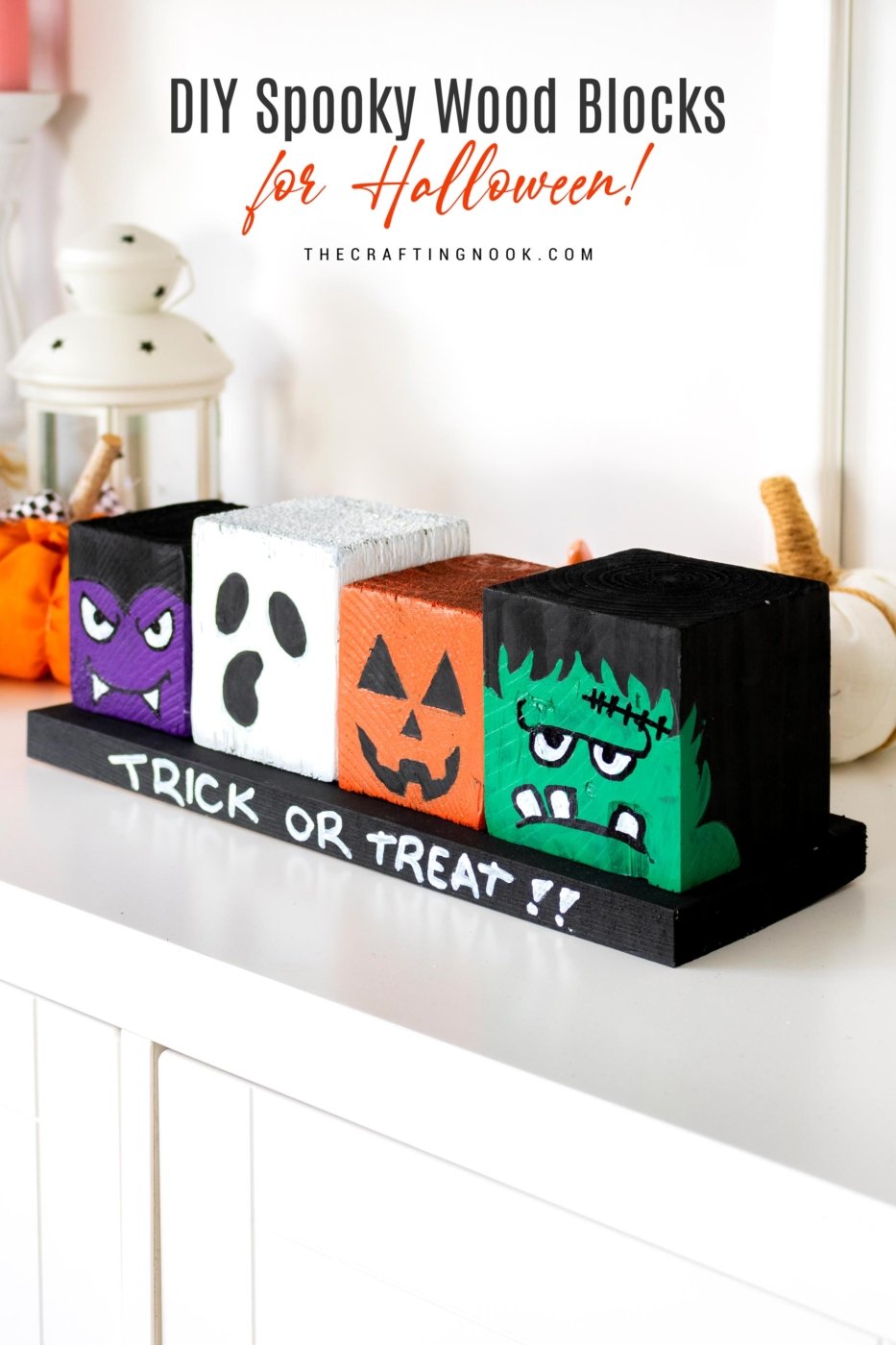 DIY Halloween Wood Blocks in line on a wood board that say trick or treat! Feature image with title text overlay