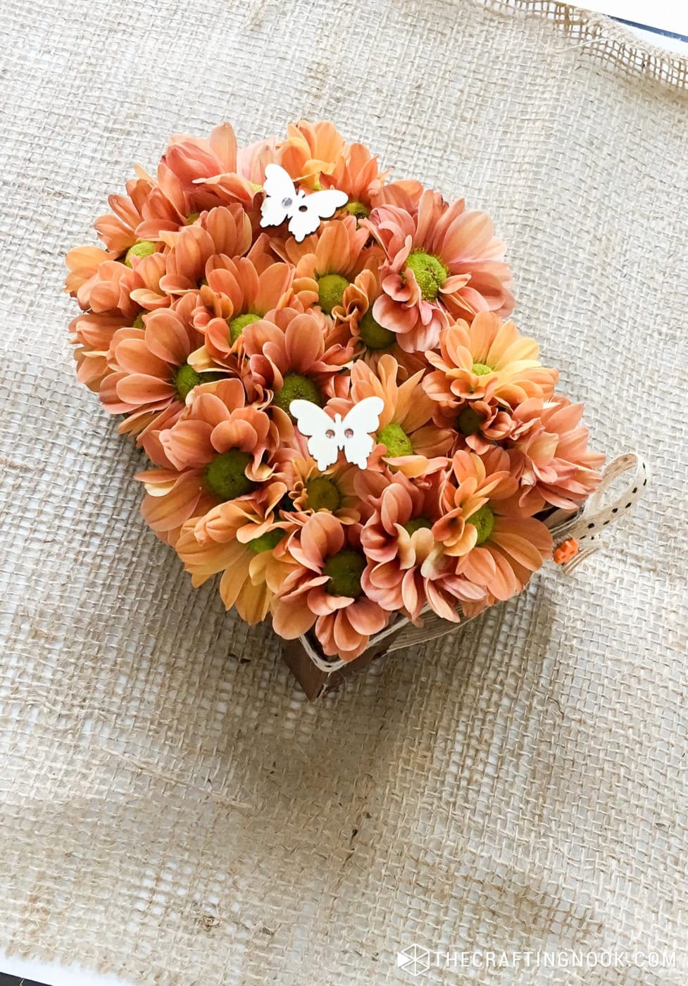 overhead view of the DIY Thanksgiving flower centerpiece with Popsicle Sticks Crate decorated with cute ribbons