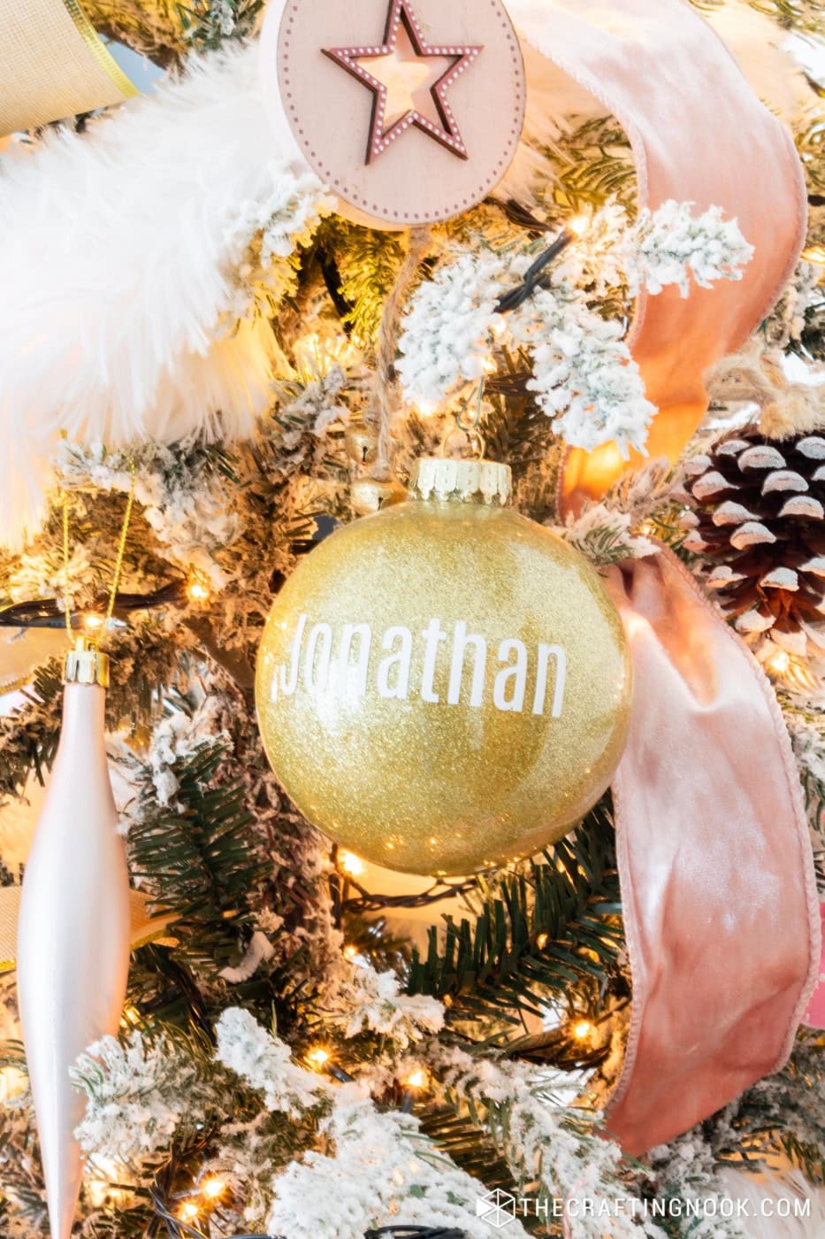 A Gold Glitter Ornament with Jonathan Name on it