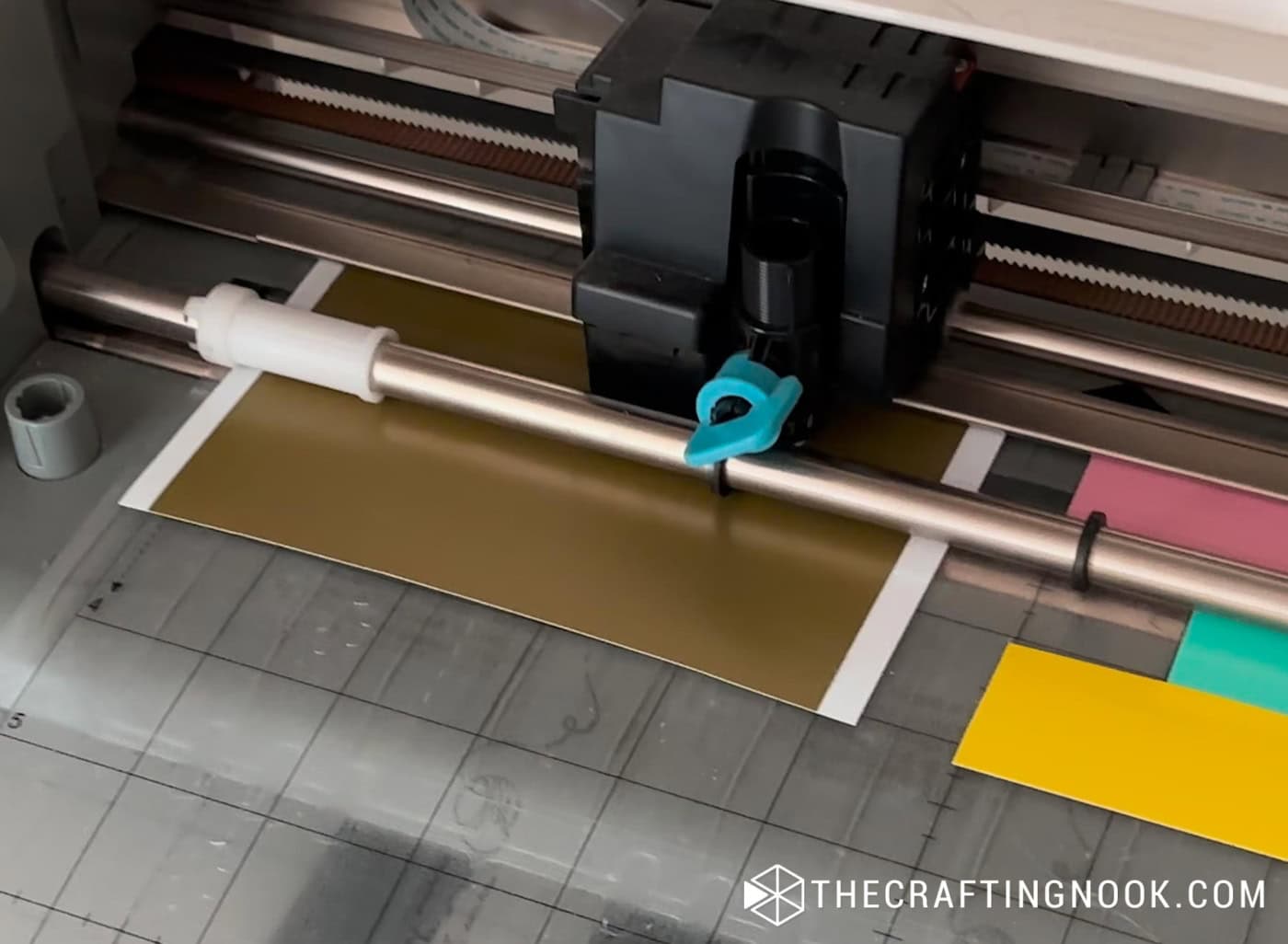 Vinyl sheets being cut in the Silhouette Cameo machine.