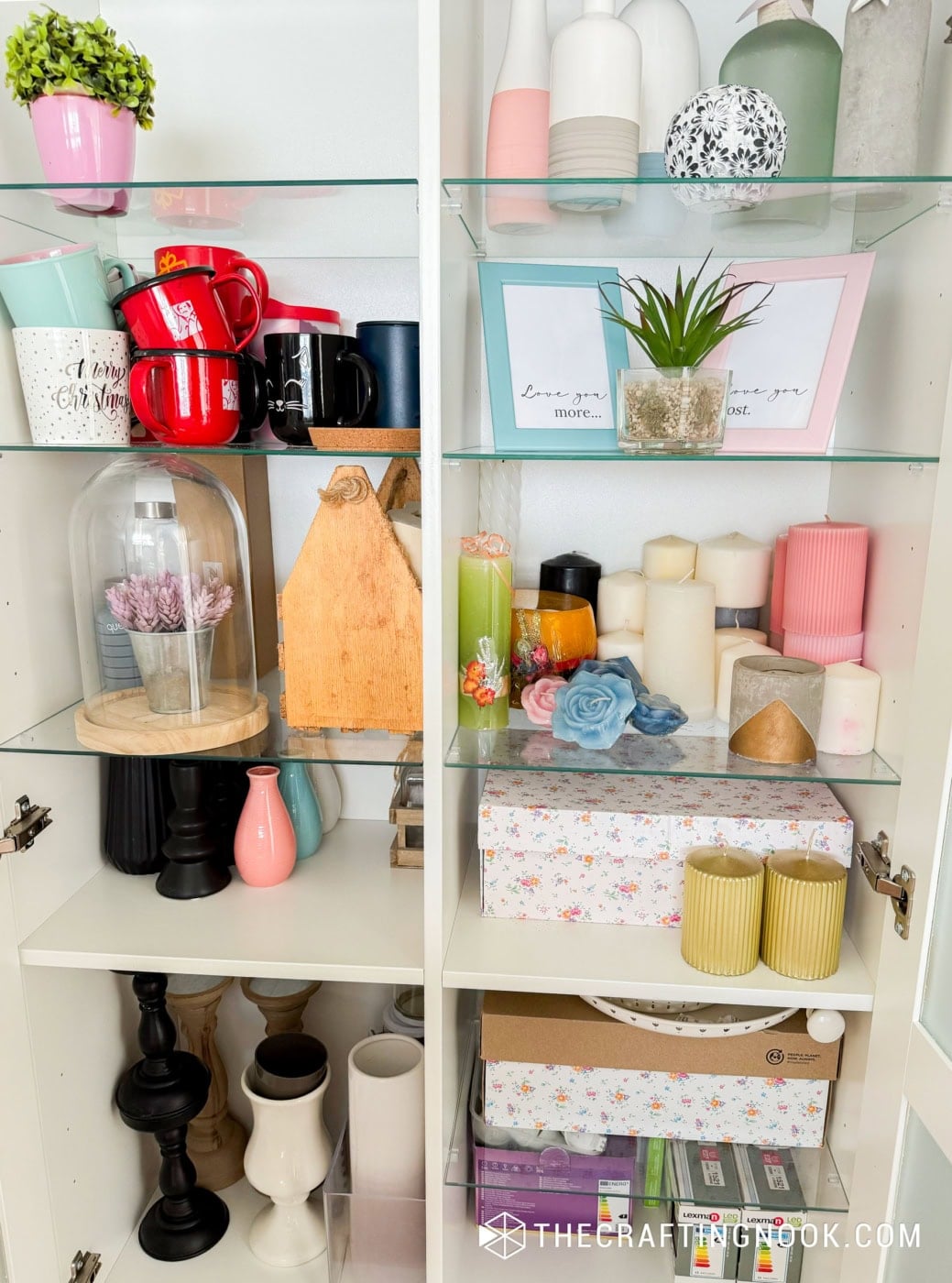 Brightly colored vases and candles arranged for seasonal decorating ideas.